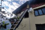 Pożar domu przy ul. Jastrzębskiej. Jedna osoba trafiła do szpitala, PSP Wodzisław